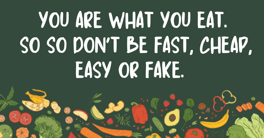 A green background with vegetables and a quote.